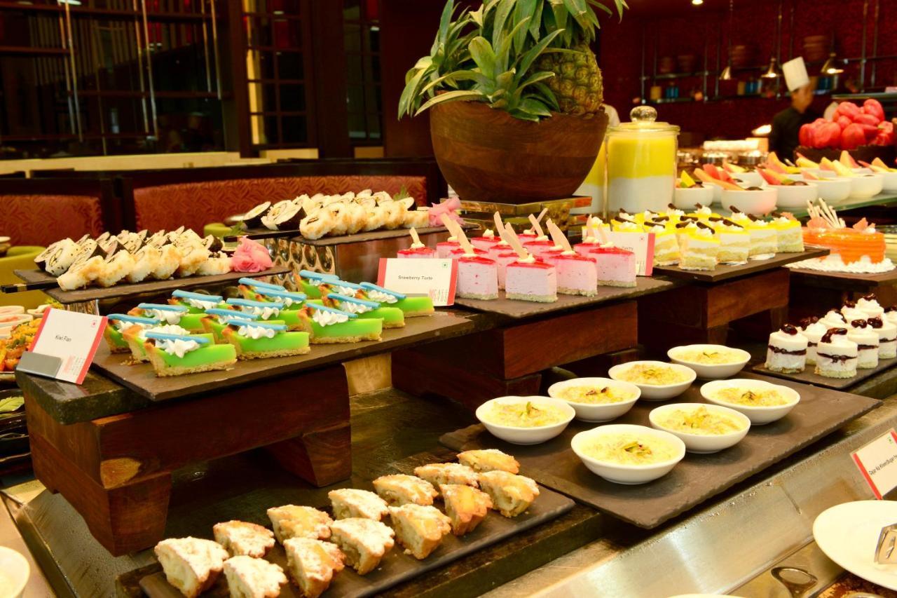Radisson Blu Hotel Guwahati Eksteriør billede A dessert buffet